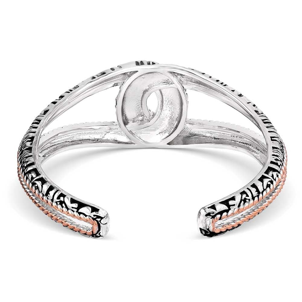 Rear angle of Montana Silversmiths Women's Luck of the Pure Bracelet, highlighting the detailed engravings and openwork design