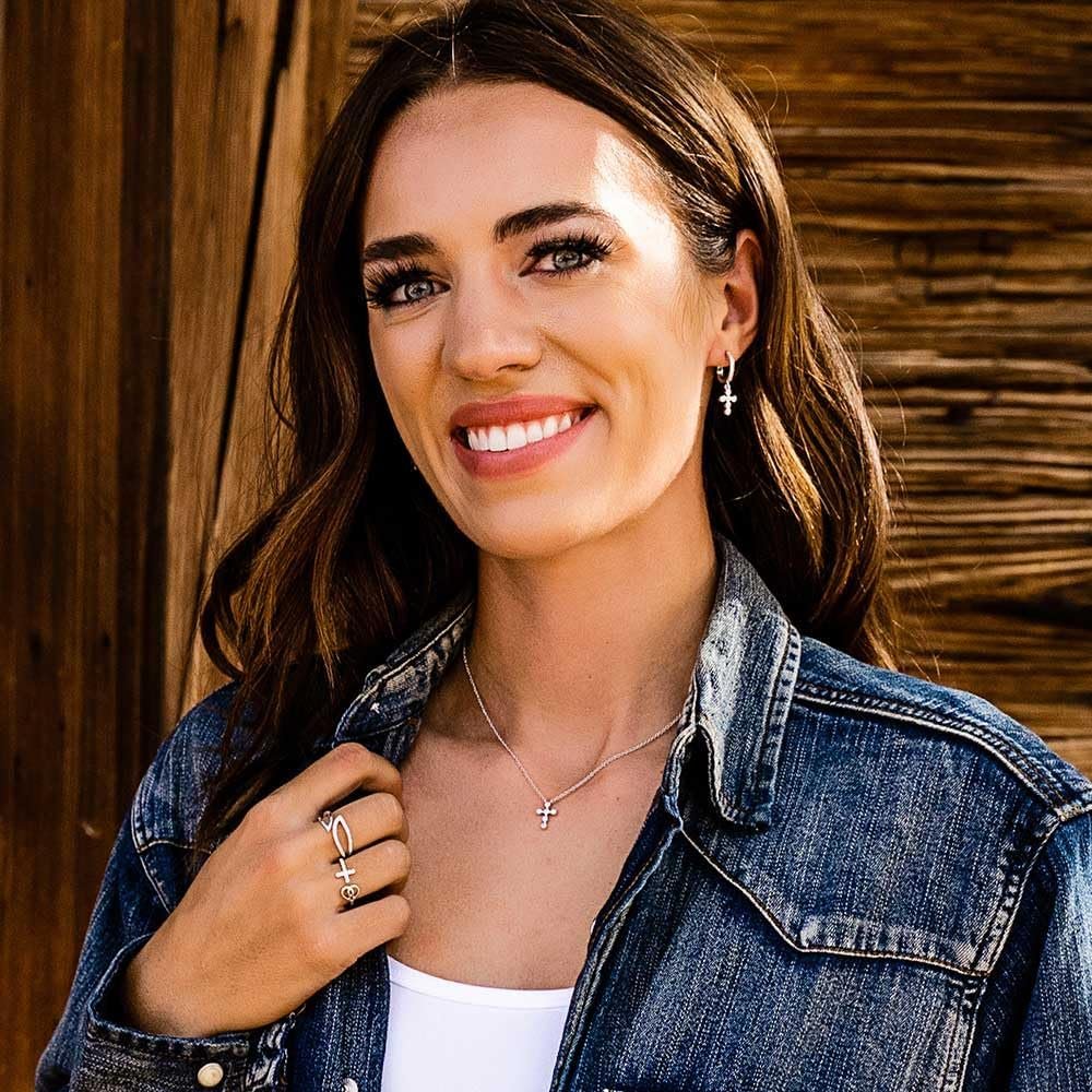 
                  
                    Woman Wearing Montana Silversmiths Women's Simple Belief Crystal Cross Earrings
                  
                