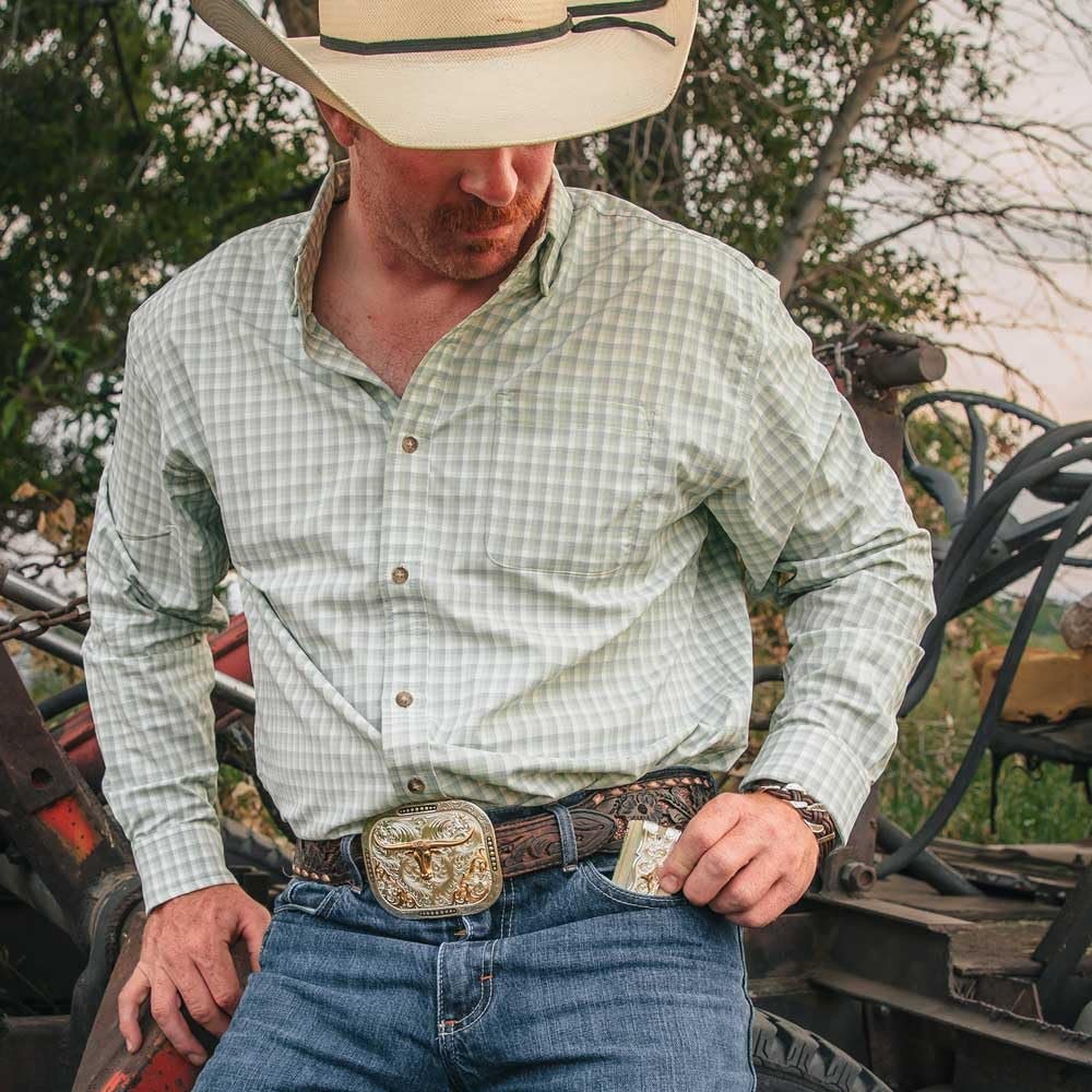 
                  
                    Cowboy Wearing Montana Silversmiths Class Act Two Tone Belt Buckle With Longhorn
                  
                