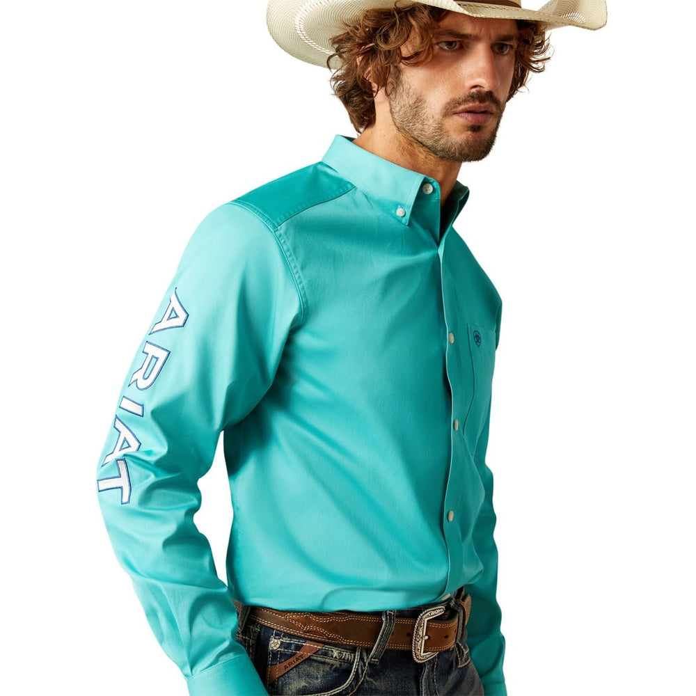 
                  
                    Close-up of Man Wearing Ariat Men's Team Logo Twill Classic Fit Shirt in Turquoise/Blue
                  
                