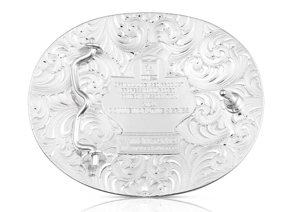 
                  
                    Back view of the NFR 2024 Belt Buckle – The reverse side of the buckle, displaying the Montana Silversmiths logo and a sturdy 1.5-inch swivel attachment.

                  
                