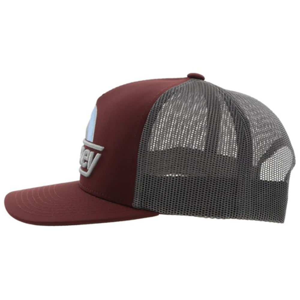 
                  
                    Side view of maroon Hooey trucker hat with structured crown
                  
                