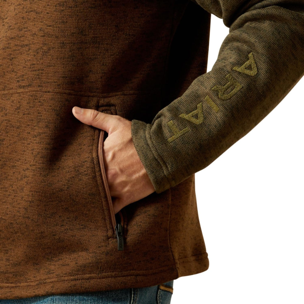 
                  
                    Pocket and sleeve detail of Ariat Men's Caldwell 1/4 Zip Sweater in Carafe/Earth Green
                  
                