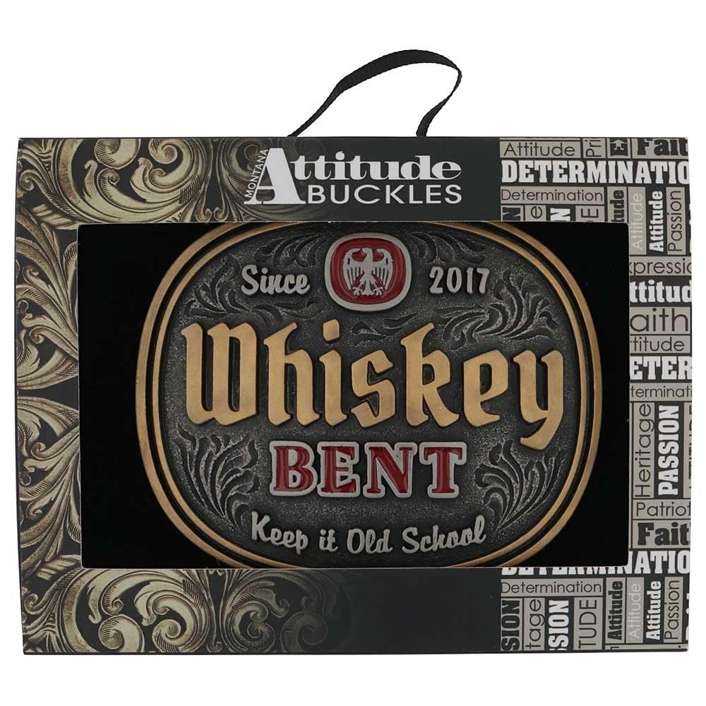 
                  
                    Whiskey Bent Belt Buckle in packaging – The Western belt buckle displayed in a Montana Silversmiths Attitude Buckles gift box, featuring intricate gold detailing and branding.

                  
                