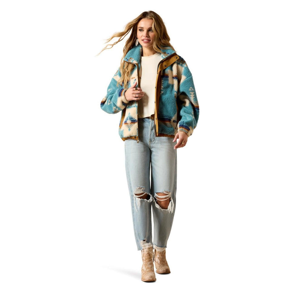 
                  
                    Woman wearing Ariat Women's Sherpa Blocked Jacket in Agave Southwest Print
                  
                