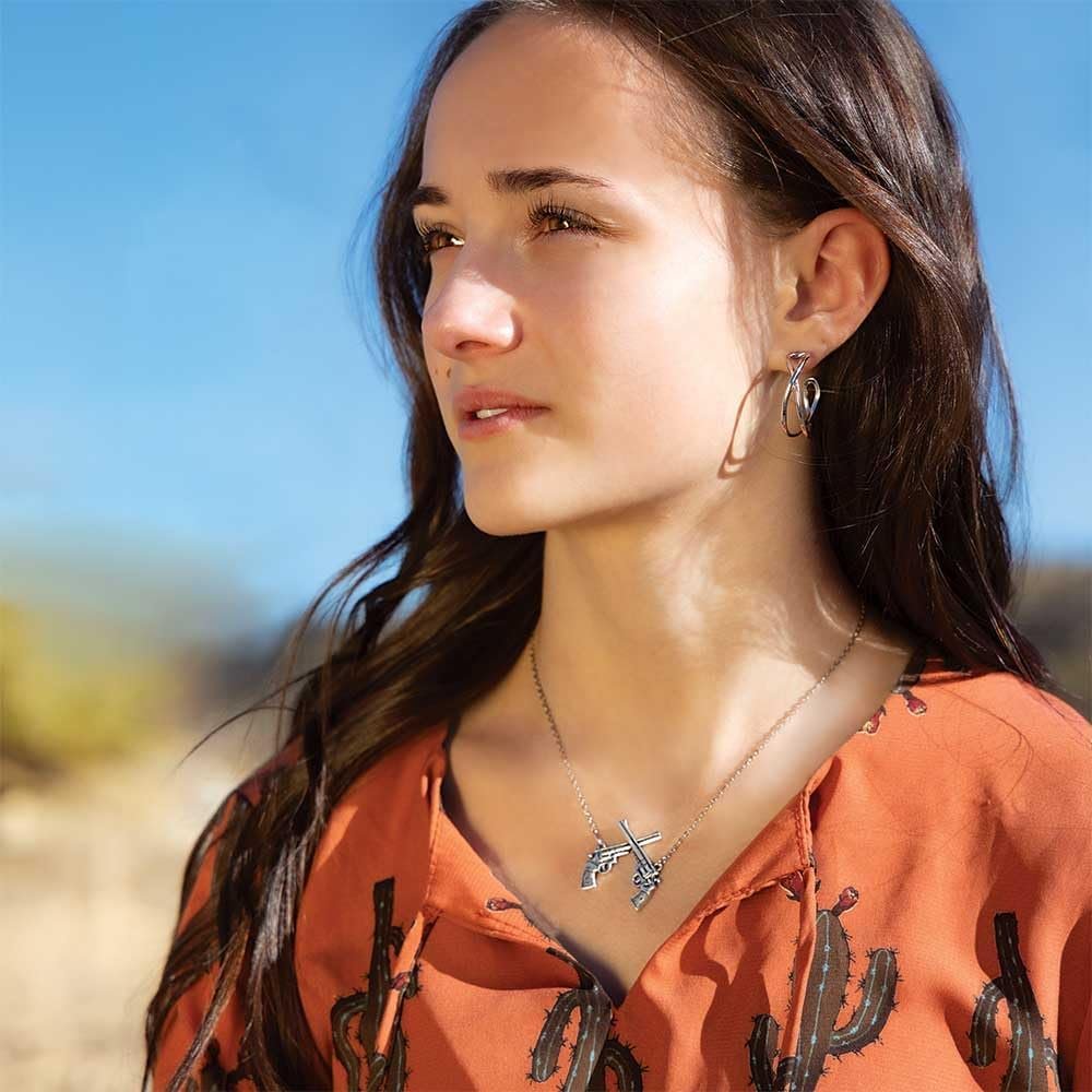 
                  
                    Woman Wearing Montana Silversmiths Women's Daring Crossed Hoop Earrings
                  
                