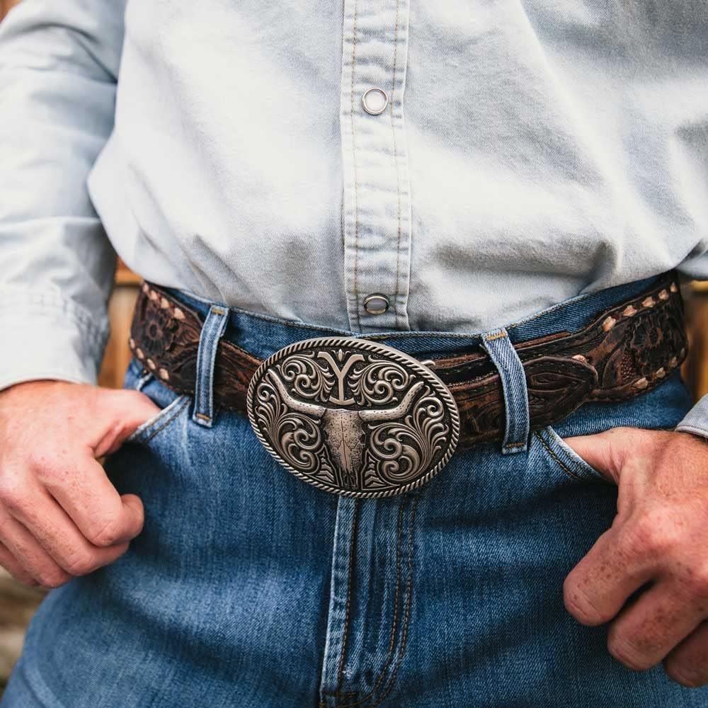 
                  
                    Man Wearing Montana Silversmiths Officially Licensed Yellowstone Attitude Belt Buckle
                  
                