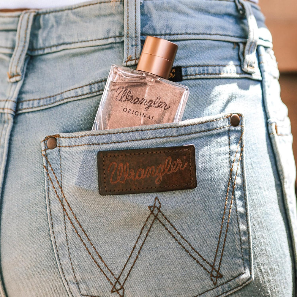 
                  
                    Bottle of Wrangler Original Perfume For Her by Tru Western in Back Pocket
                  
                