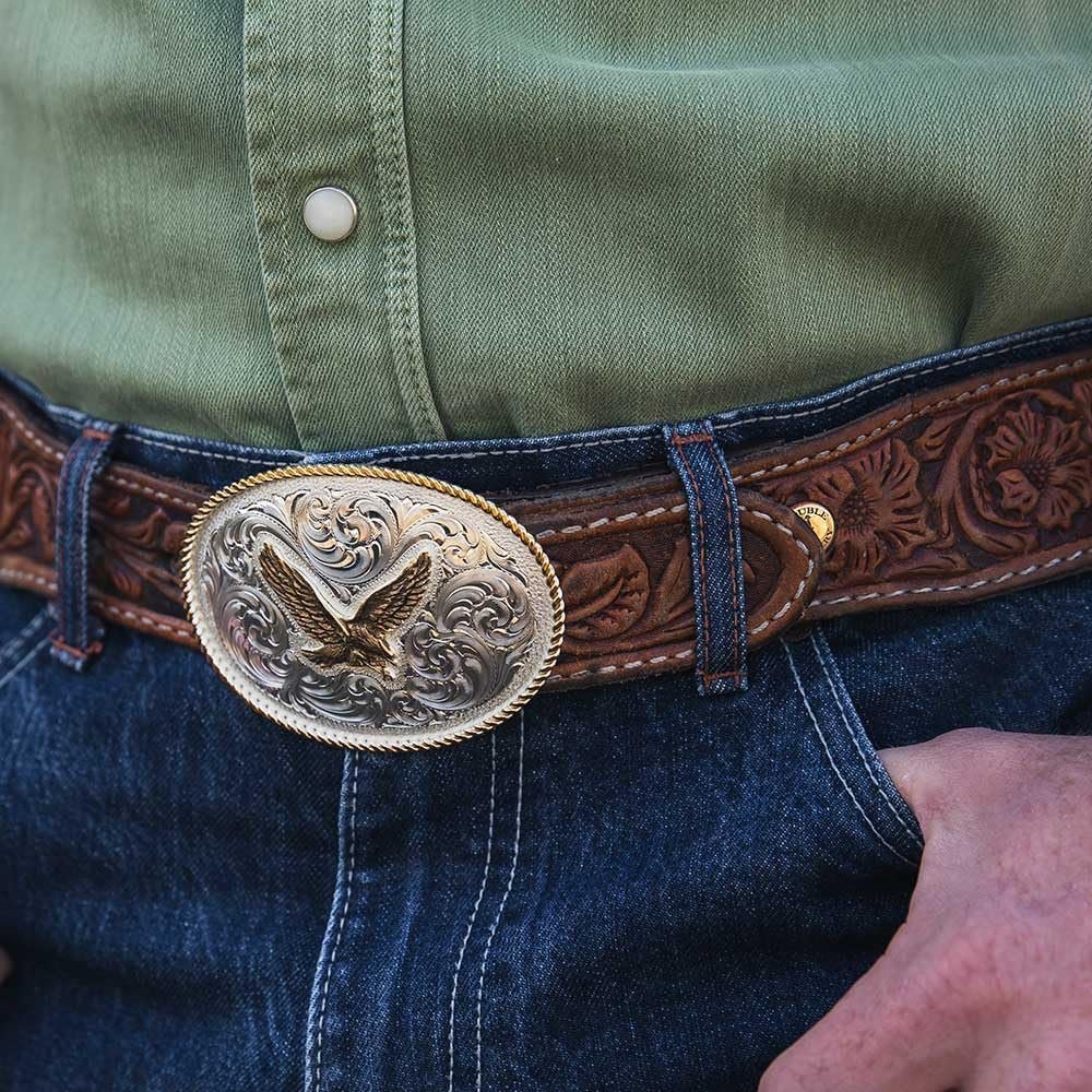 
                  
                    Man Wearing Montana Silversmiths Wings of Strength Belt Buckle
                  
                