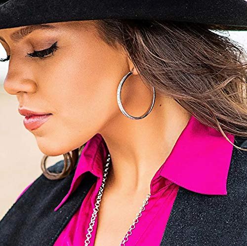 Woman Wearing Montana Silversmiths Women's Star Light Lined Hoop Earrings 