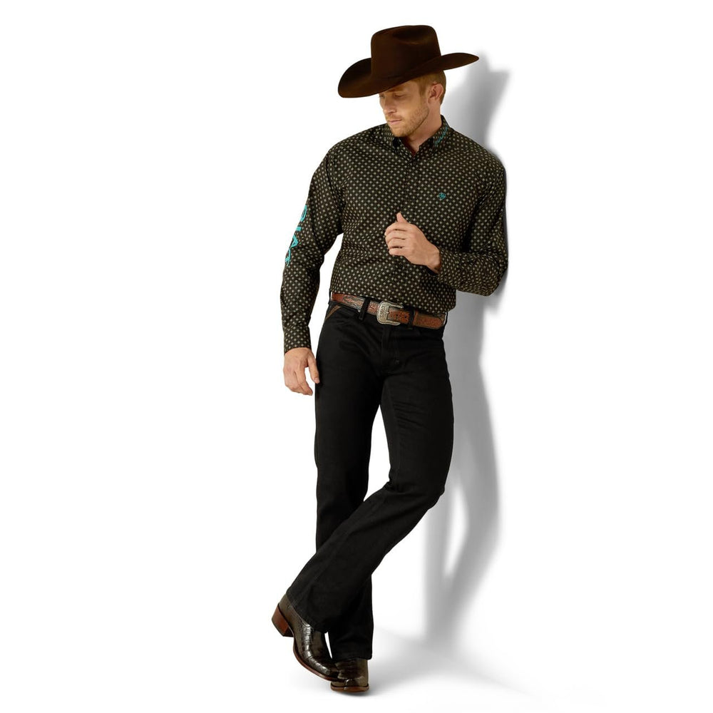 
                  
                    Model wearing Ariat Men's Team Philbert Classic Fit Shirt in Black/Teal
                  
                