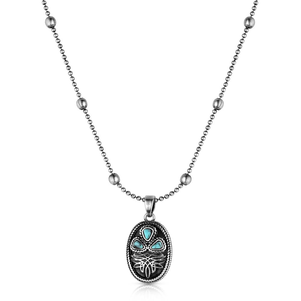 Montana Silversmiths Boot Stitch Turquoise Necklace featuring a crafted turquoise boot stitch pendant with polished silver-tone Western styling.