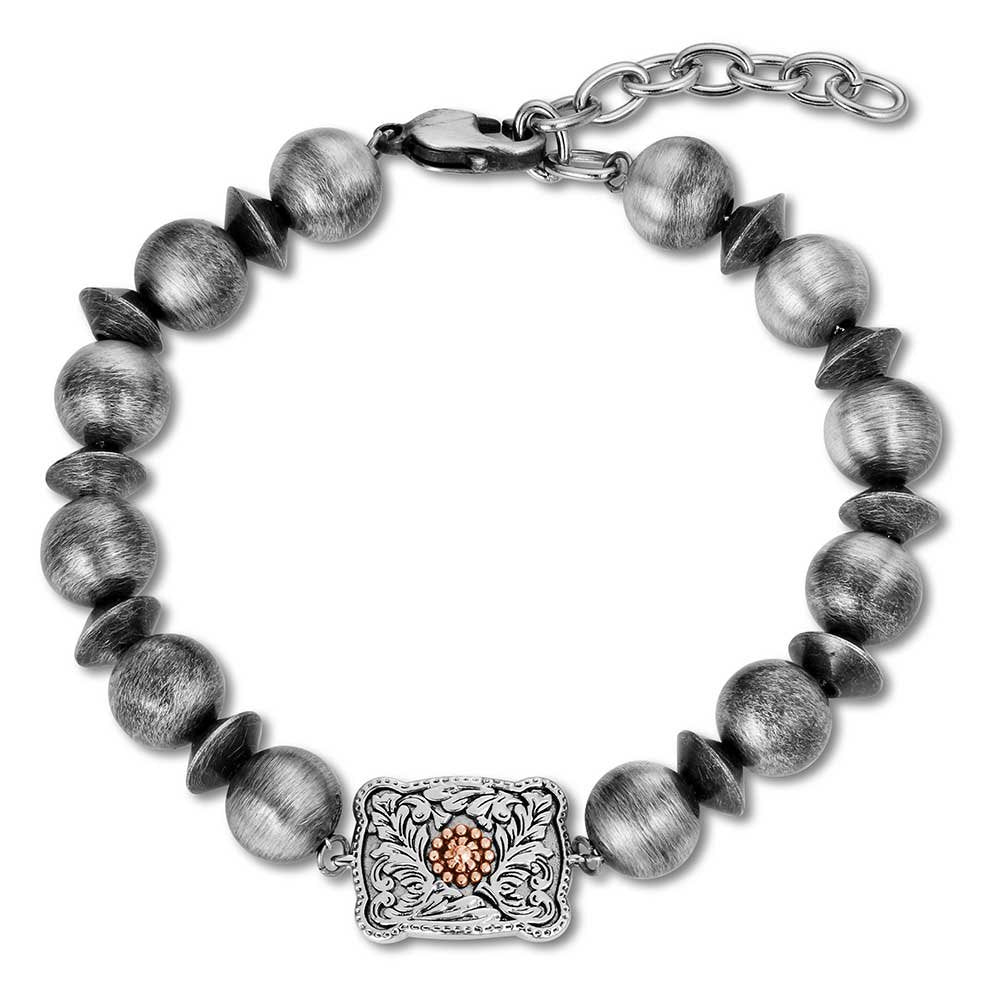 Montana Silversmiths Cowgirl Pearls Buckle Bracelet featuring faux pearls, a Western buckle charm, and polished silver-tone accents.