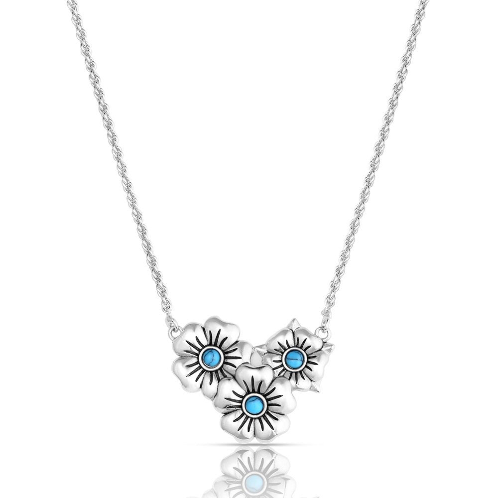 Montana Silversmiths Montana Spring Floral Necklace featuring a crafted turquoise flower pendant with polished silver-tone Western styling.