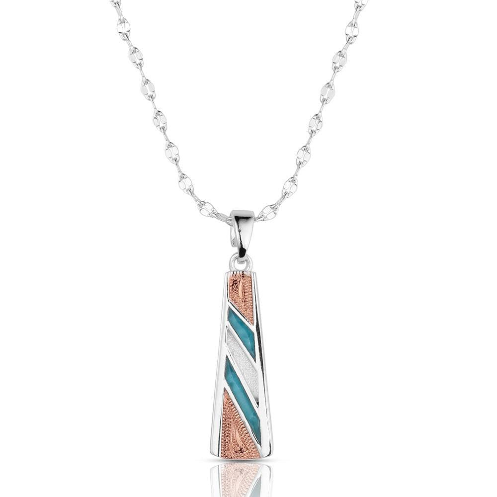 Montana Silversmiths Tulsa Time Necklace featuring a crafted turquoise horseshoe pendant with polished silver-tone Western styling.