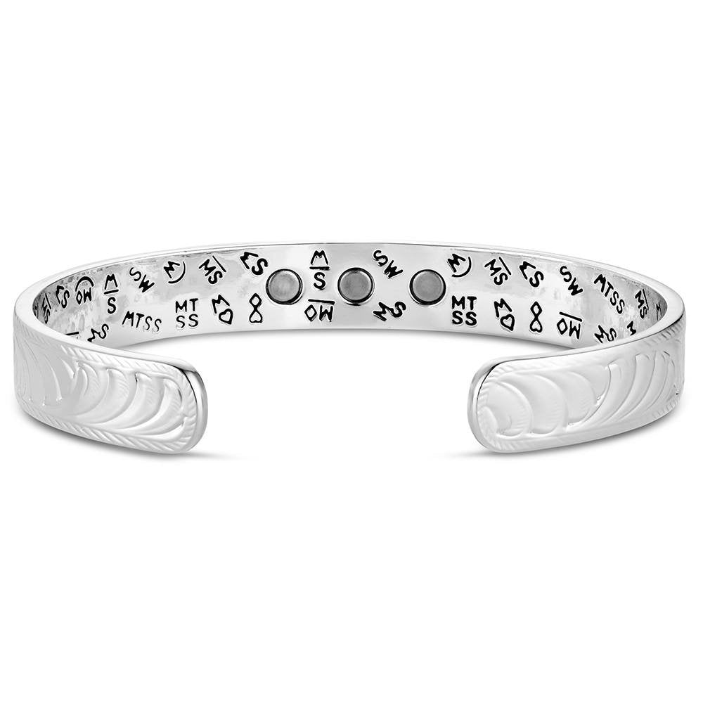 Silver Western cuff bracelet with detailed engraved scrollwork by Montana Silversmiths.