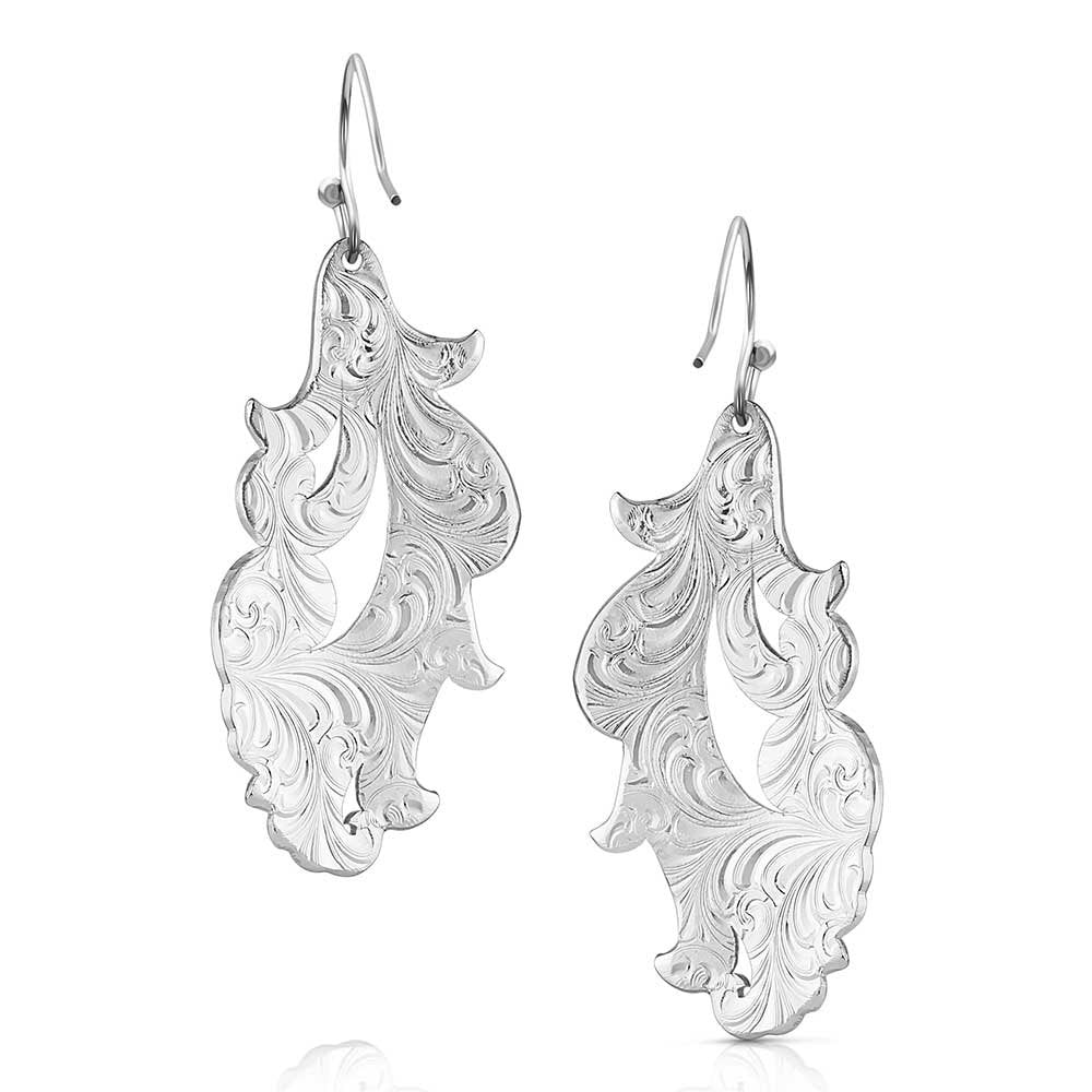 Silver Western dangle earrings by Montana Silversmiths with flowing engraved details and classic cowgirl-inspired style.