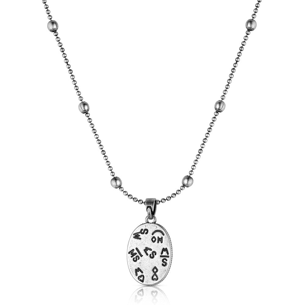 Western boot stitch pendant necklace by Montana Silversmiths featuring crafted turquoise, engraved silver-tone details, and classic cowgirl-inspired design.