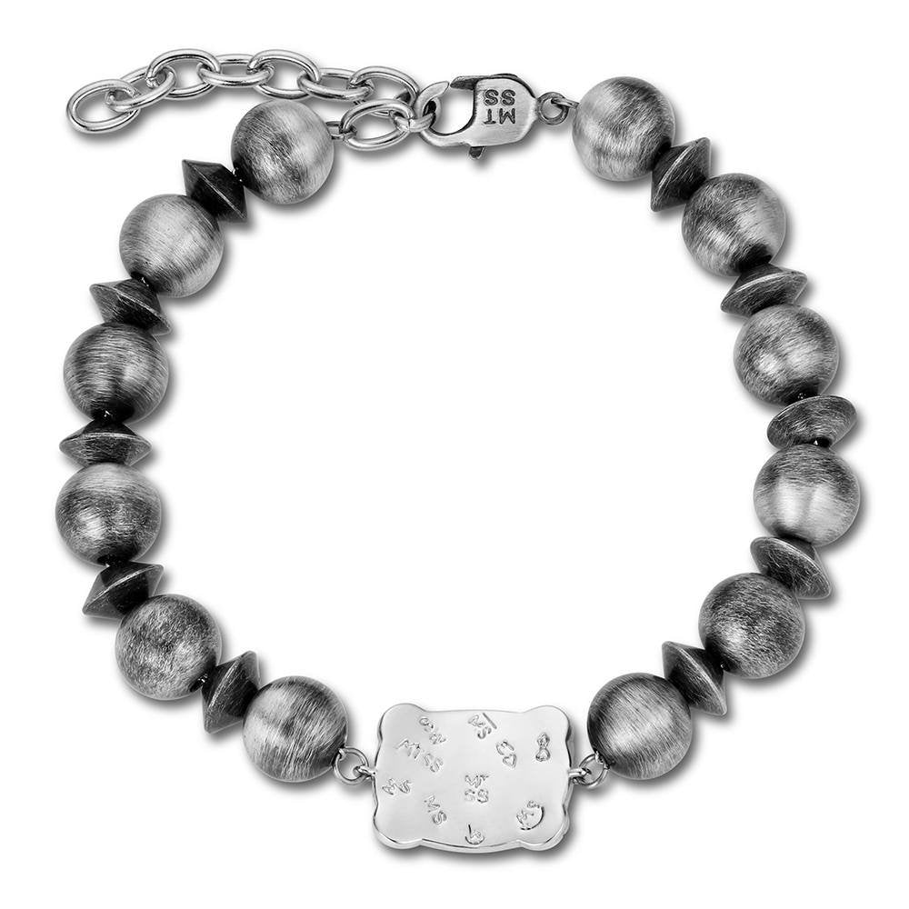 Western pearl charm bracelet by Montana Silversmiths with a silver-tone buckle centerpiece and elegant cowgirl styling.