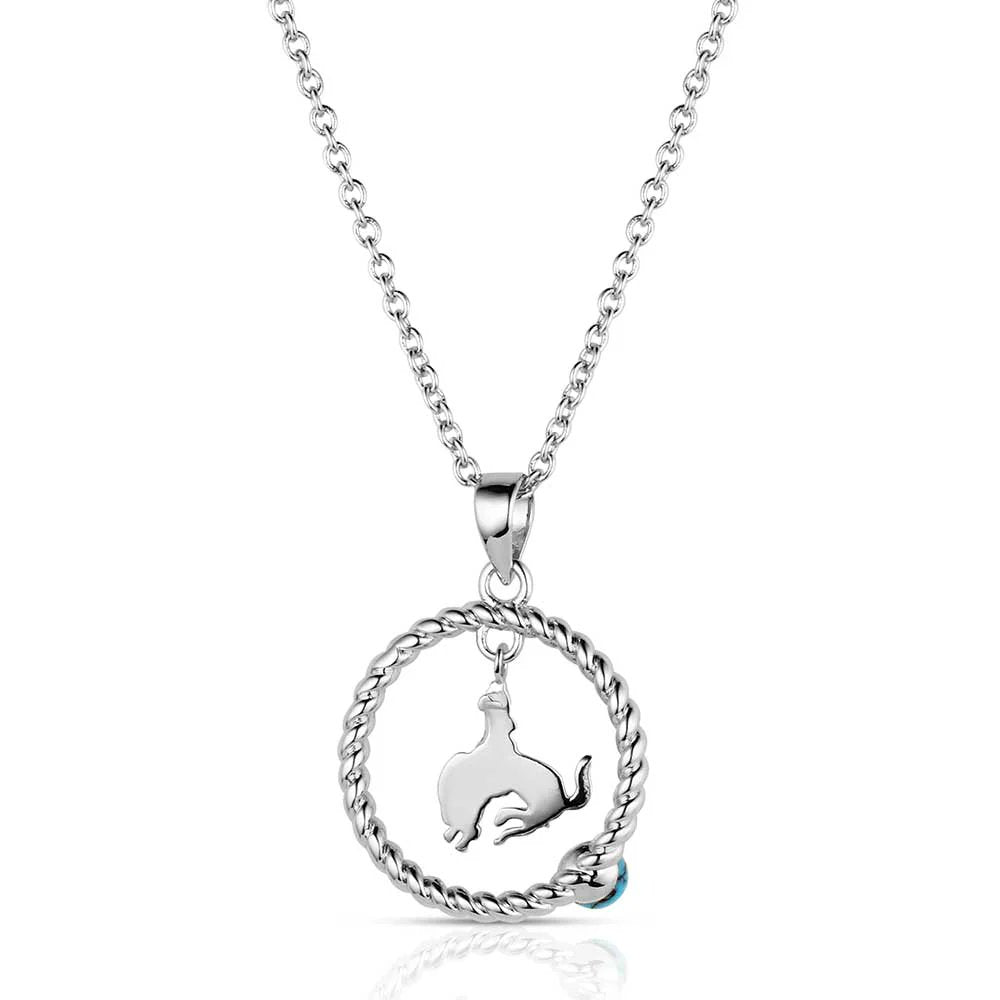 Western turquoise circle pendant necklace by Montana Silversmiths featuring crafted turquoise, a polished silver-tone finish, and classic Southwestern-inspired design.