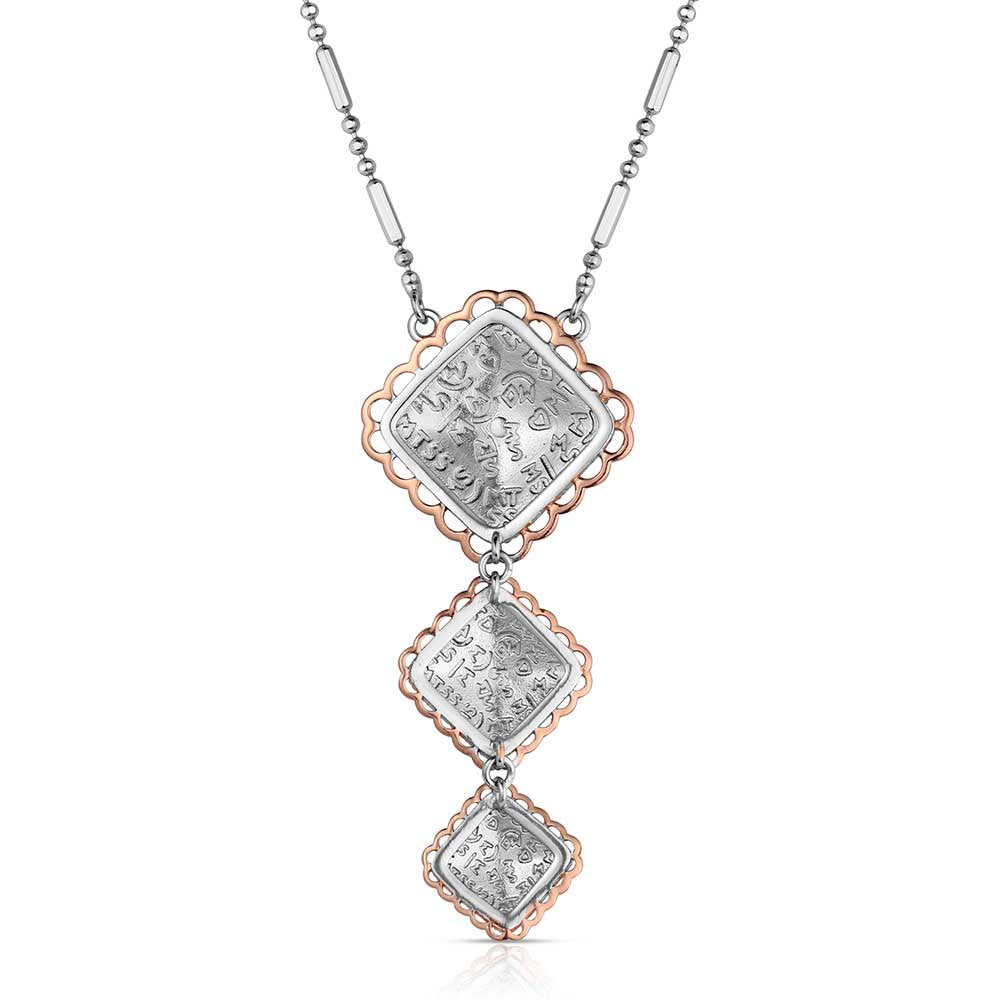 Western turquoise two-tone pendant necklace by Montana Silversmiths featuring crafted turquoise, silver and gold-tone accents, and elegant Southwestern-inspired design.