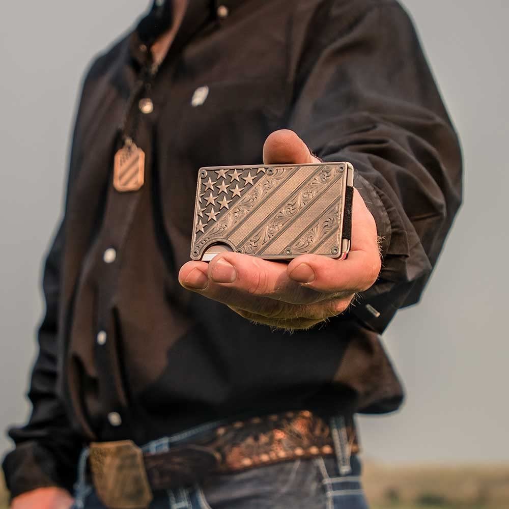 
                  
                    Cowboy Using Montana Silversmiths All American Bronze Credit Card Holder
                  
                