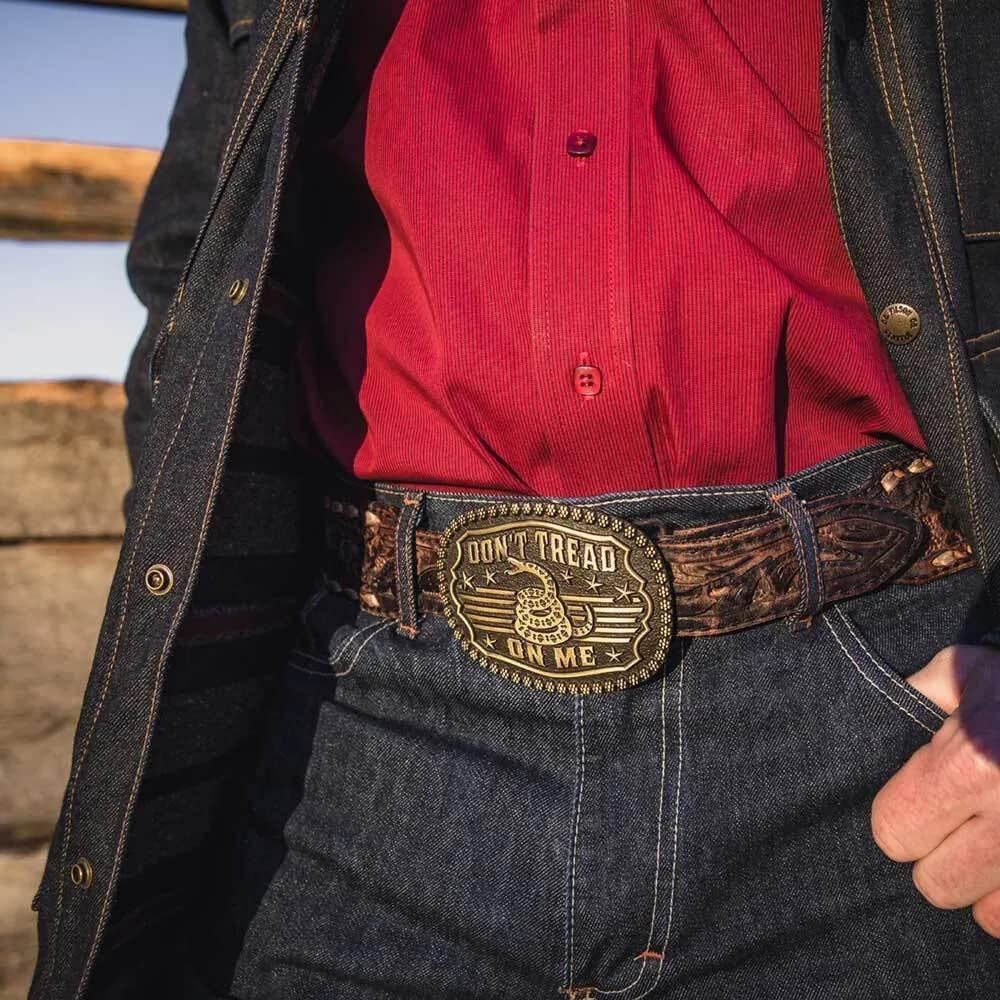Man Wearing Montana Silversmiths Men's Gadsden Snake Heritage Attitude Buckle