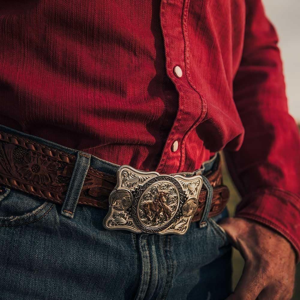 Cowboy Wearing Montana Silversmiths Buffalo Nickel Southwestern Buckle With End of the Trail