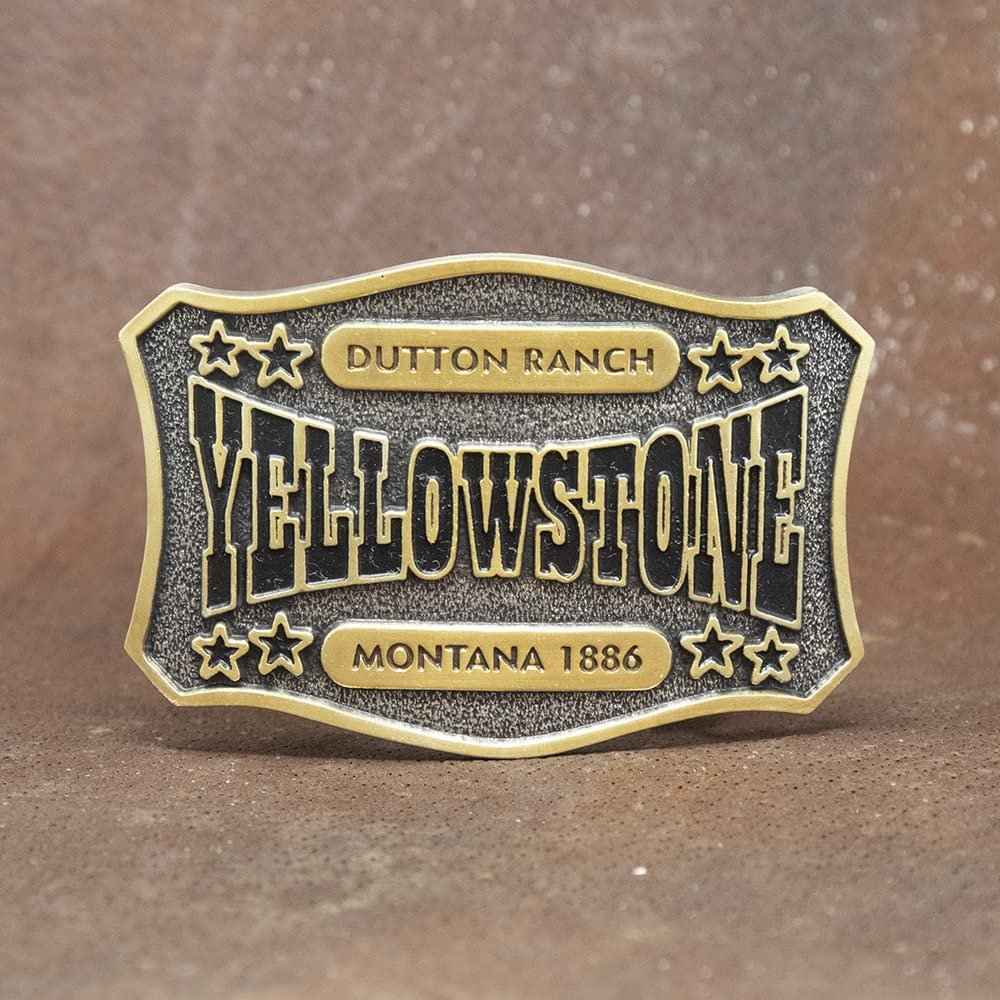 
                  
                    Montana Silversmiths x Yellowstone Collection Belt Buckle, With Dutton Ranch Yellowstone Montana Engraving Against Brown Background
                  
                