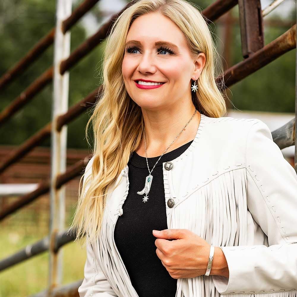 
                  
                    Woman Wearing Montana Silversmiths Women's Chiseled Spurs Earrings
                  
                