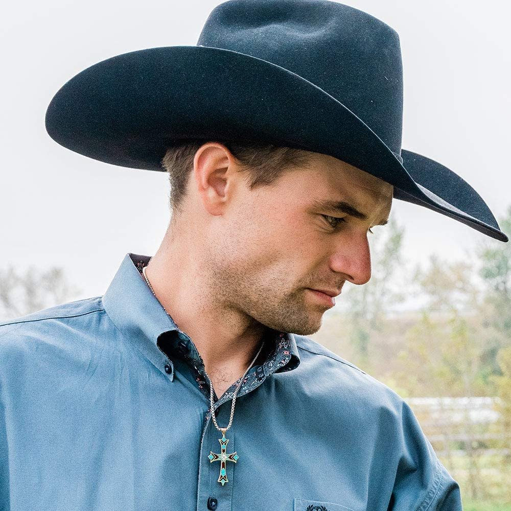 
                  
                    Close-up of Cowboy Wearing Montana Silversmiths American Legends Embracing Faith Cross Necklace
                  
                