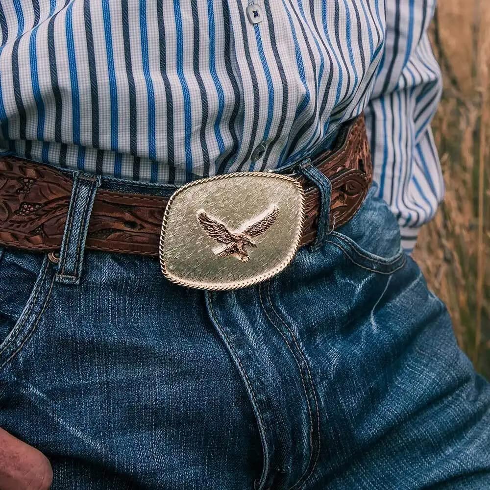 
                  
                    Man Wearing Montana Silversmiths Men's Rippling Waters Custom Western Belt Buckle, Eagle
                  
                