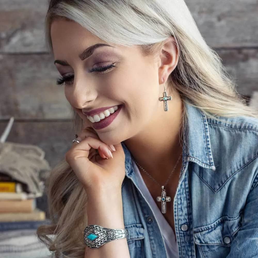 
                  
                    Woman Wearing Montana Silversmiths Faith on Point Turquoise Cross Earrings
                  
                