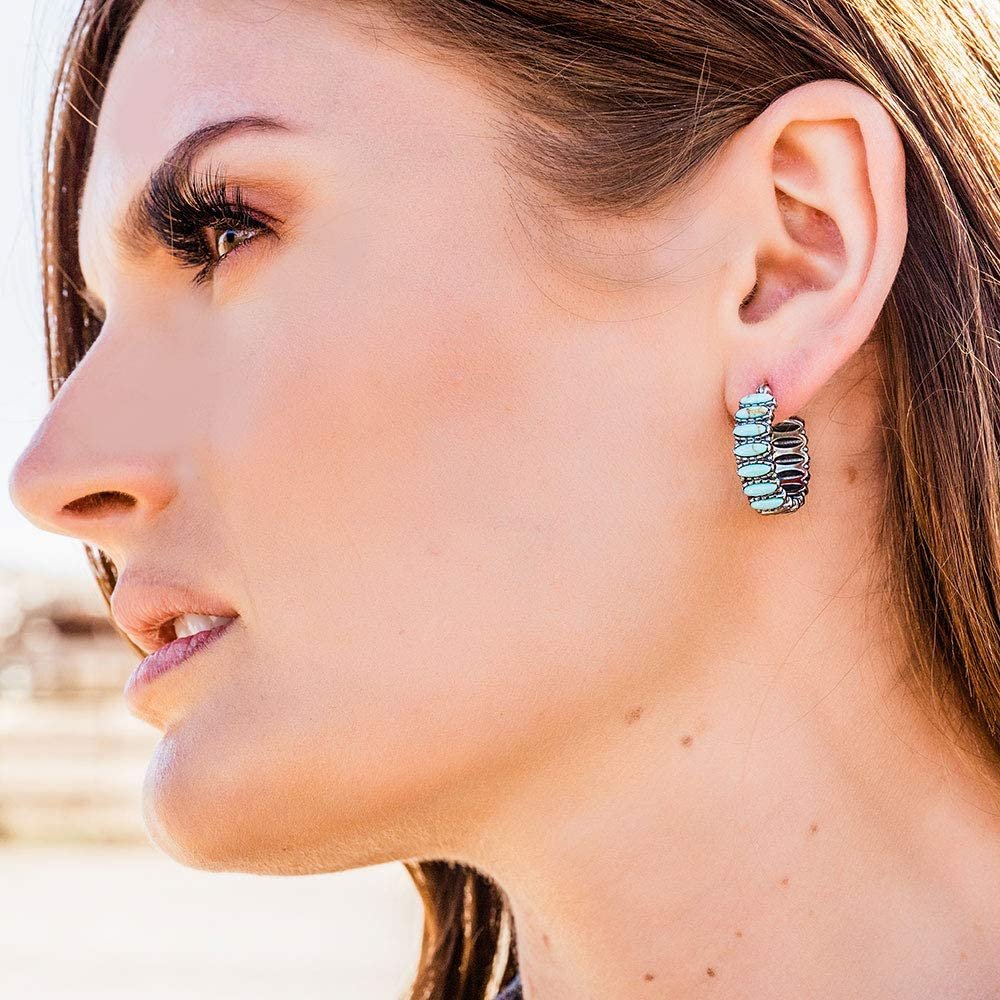
                  
                    Woman Wearing Montana Silversmiths Women's Turquoise Run Earrings
                  
                