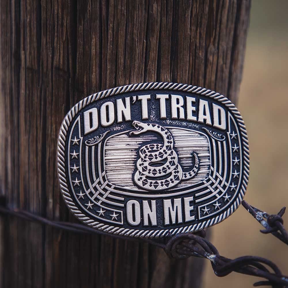 
                  
                    Montana Silversmiths Don't Tread on Me Buckle on Wooden Post
                  
                