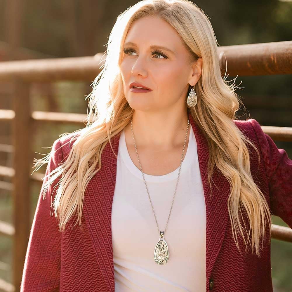 
                  
                    Woman Wearing Montana Silversmiths Women's Wildflower Impressions Earrings
                  
                