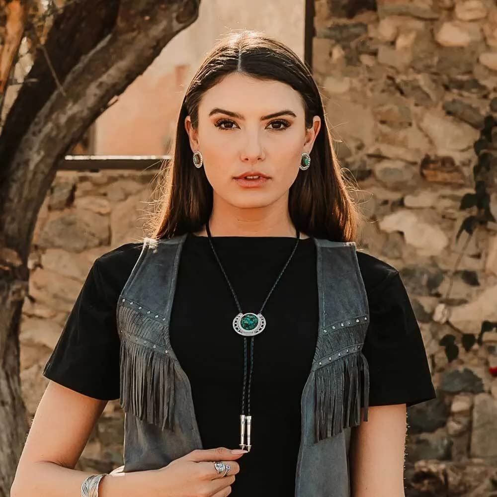
                  
                    Cowgirl Wearing Montana Silversmiths Eagle Bolo Tie
                  
                