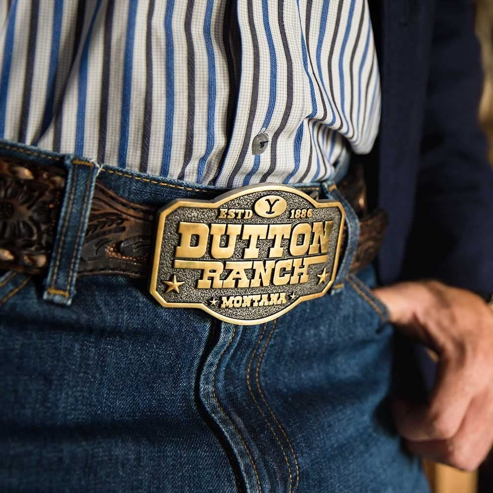
                  
                    Close-up of Man Wearing Montana Silversmiths x Yellowstone Collection Belt Buckle, With Dutton Ranch Montana Engraving
                  
                