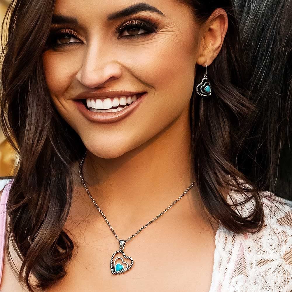 
                  
                    Woman Wearing Montana Silversmiths Clearer Ponds Turquoise Heart Necklace
                  
                