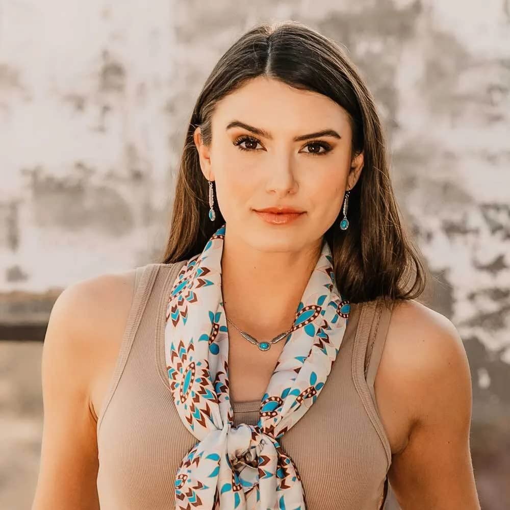 
                  
                    Woman Wearing Montana Silversmiths From the Ground Up Turquoise Earrings
                  
                