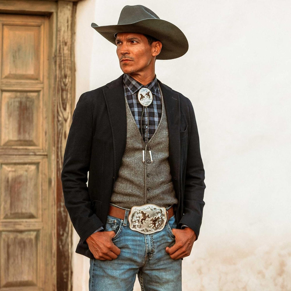 
                  
                    Man With Cowboy Hat Wearing Montana Silversmiths Giant Scalloped Two Tone Belt Buckle With Fighting Roosters
                  
                