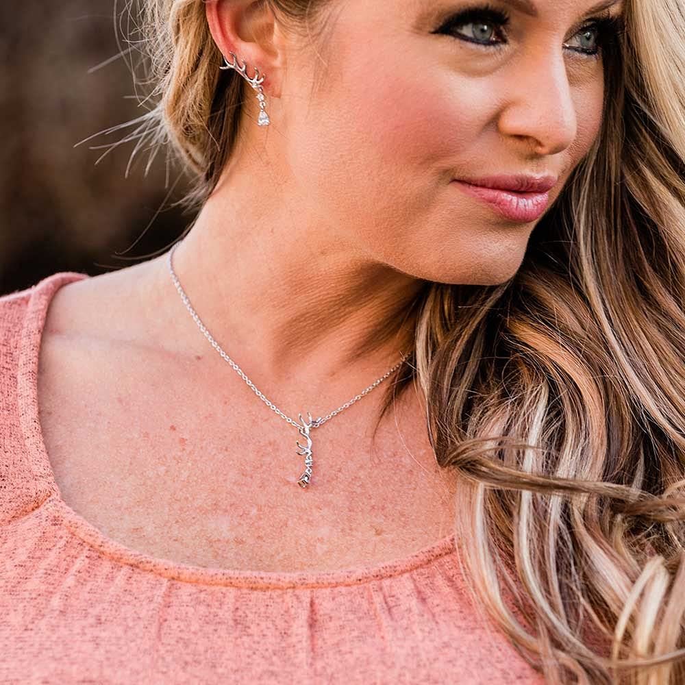 
                  
                    Woman Wearing Montana Silversmiths Kristy Titus Nature's Chandelier Earrings
                  
                