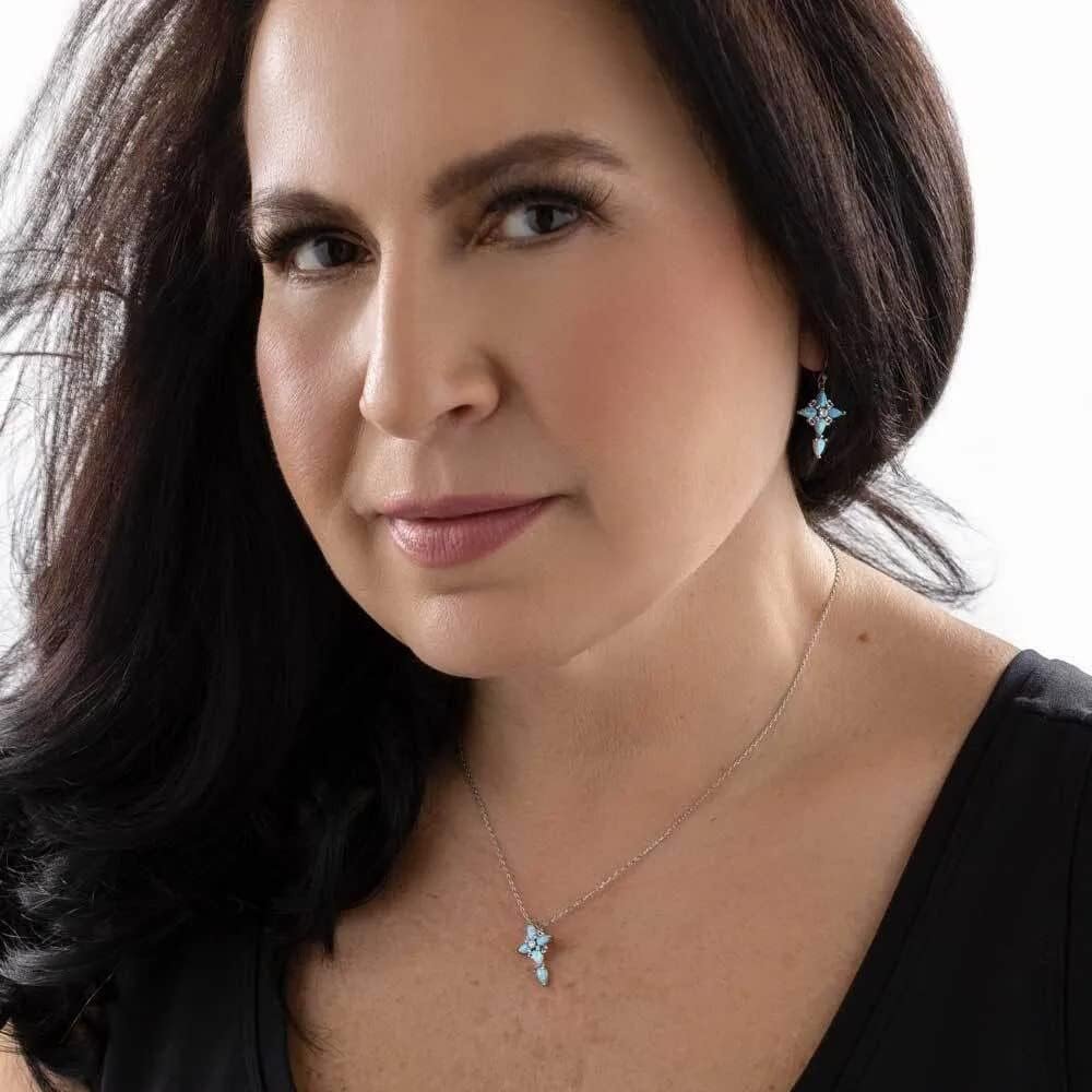 
                  
                    Woman Wearing Montana Silversmiths Women's Inspirational Faith Opal Cross Necklace
                  
                