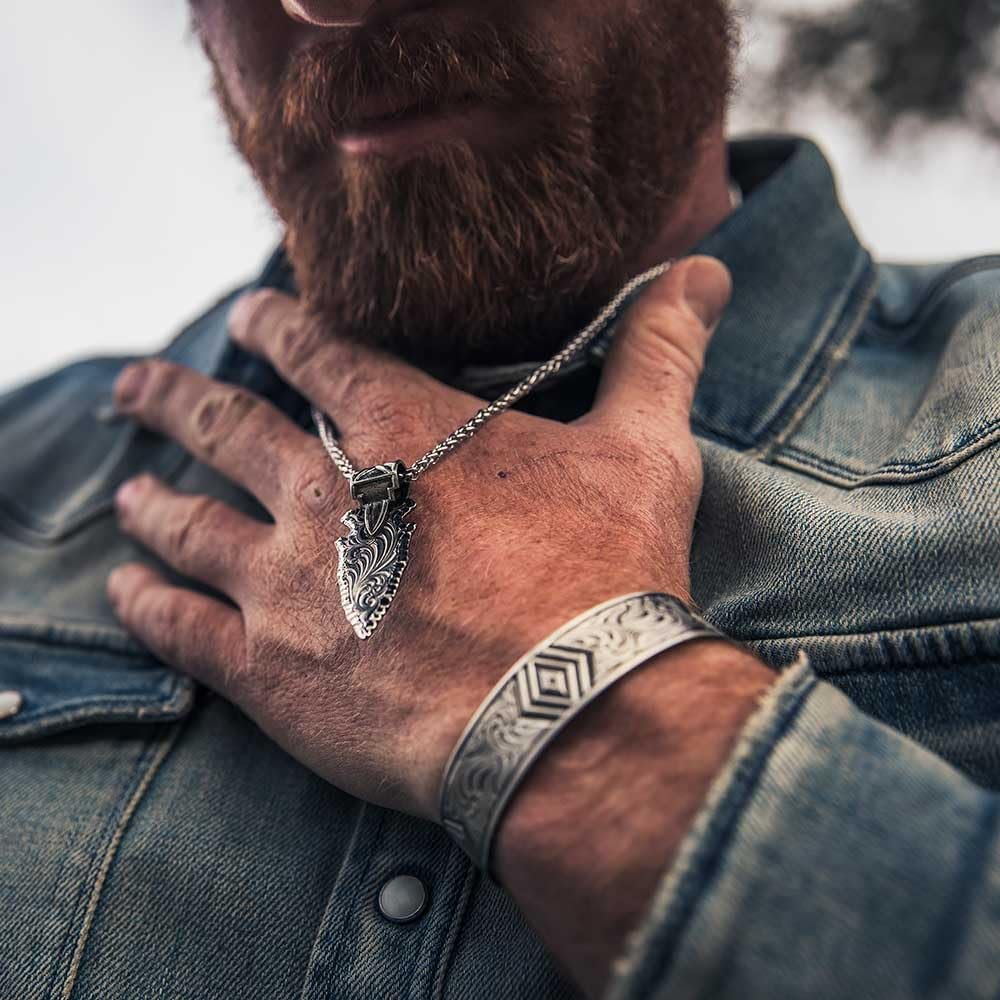Man Wearing Montana Silversmiths Men's Old West Arrowhead Necklace