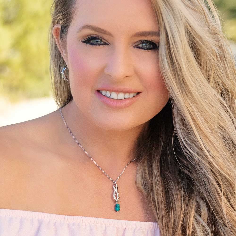Woman Wearing Montana Silversmiths Kristy Titus Rooted in Stone Silver Antler Necklace