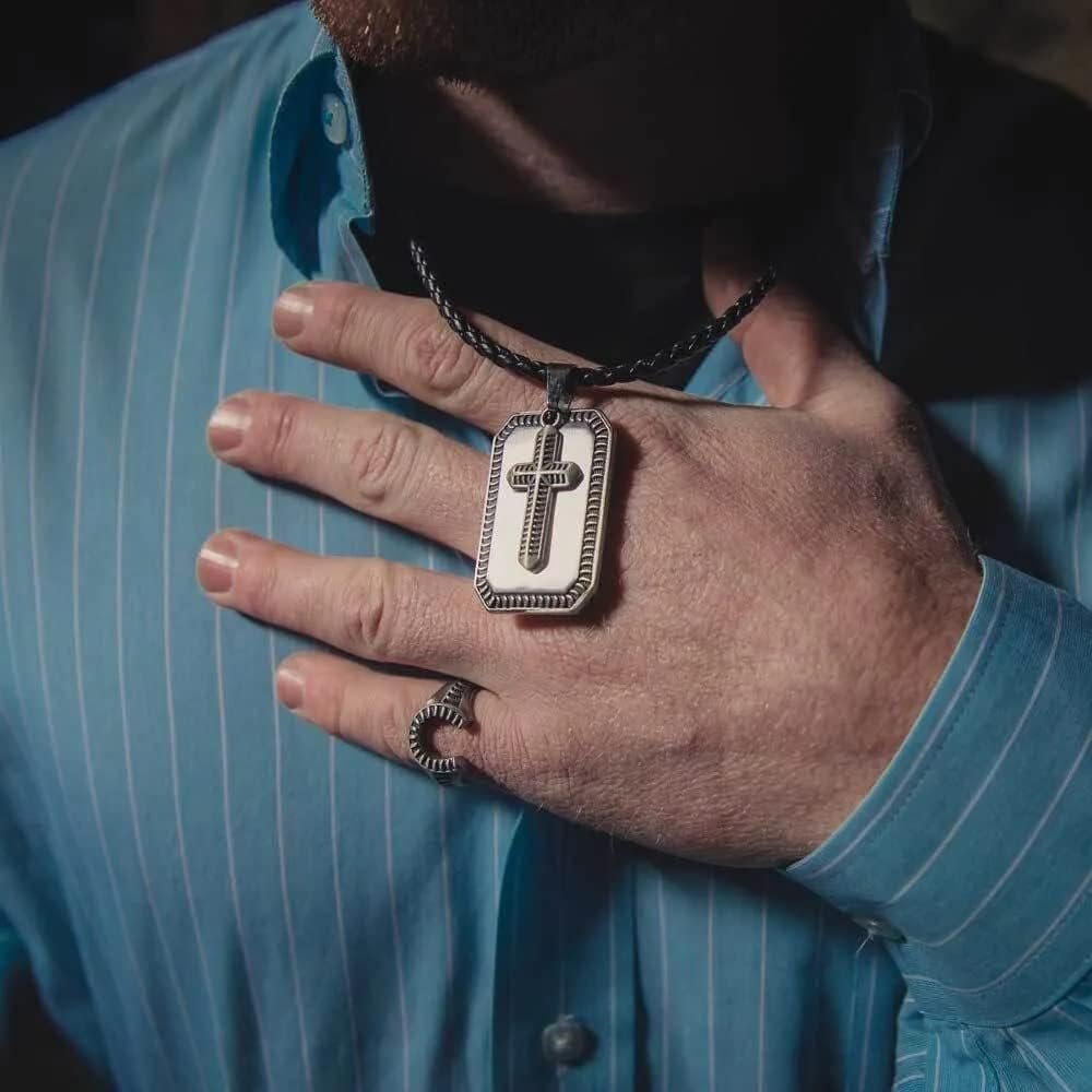 Man Wearing Montana Silversmiths Men's Striking Edge Cross Dog Tag Necklace