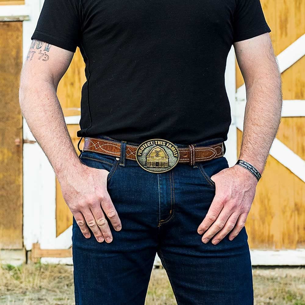 
                  
                    Man Wearing Montana Silversmiths Officially Licensed Yellowstone Protect This Family Belt Buckle
                  
                