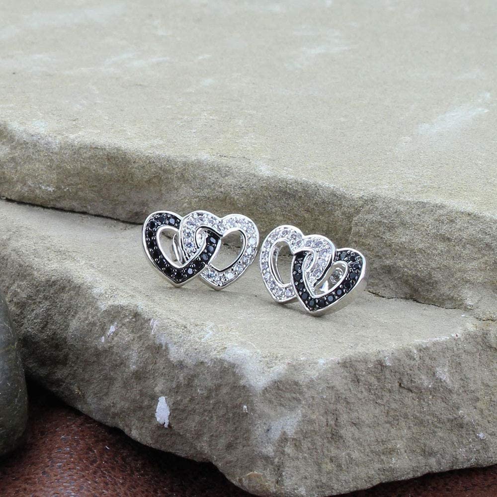 Montana Silversmiths Women's Heart Stud Earrings on Stone Background