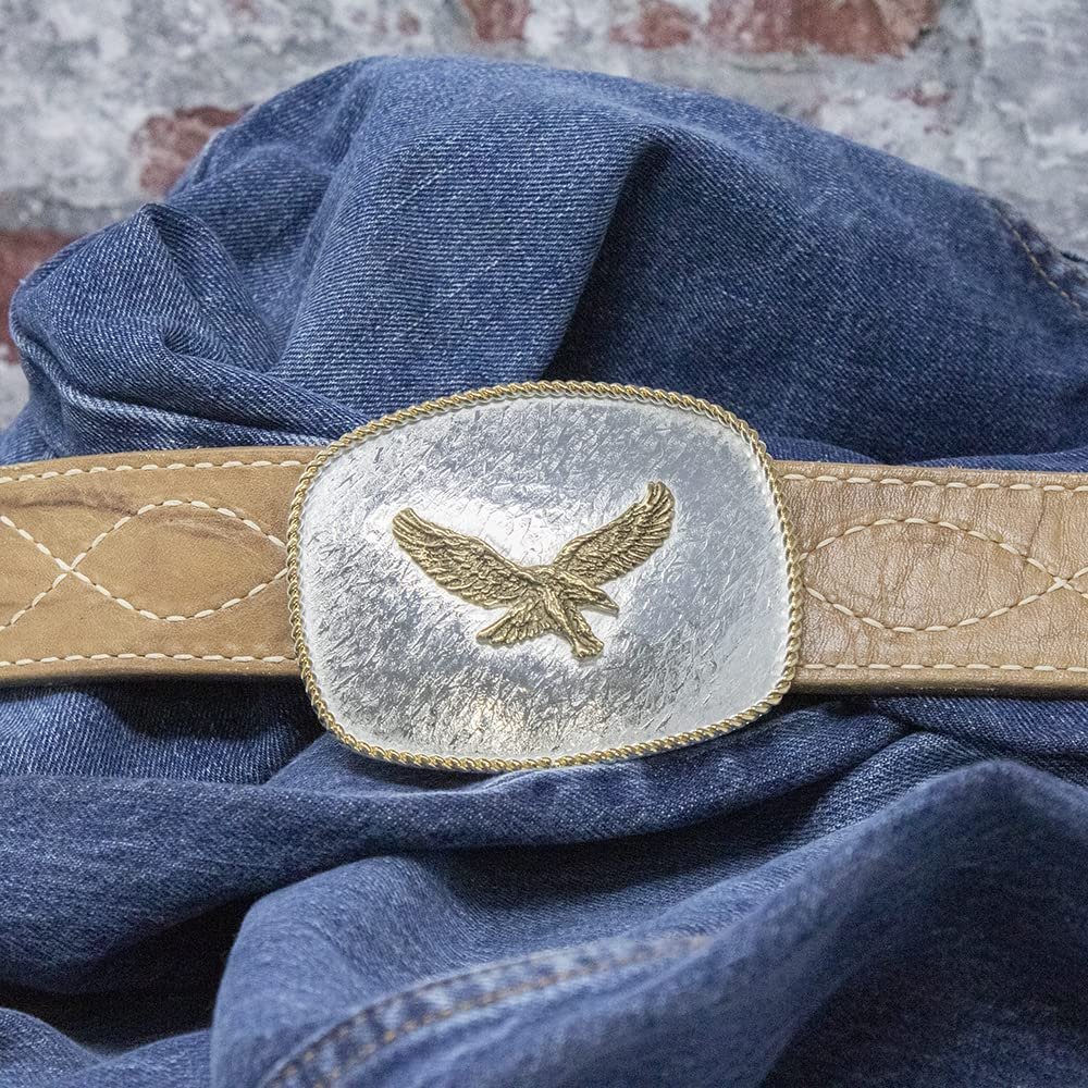 
                  
                    Montana Silversmiths Men's Rippling Waters Custom Western Belt Buckle, Eagle, Against Denim Background
                  
                