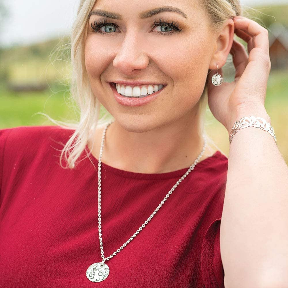 
                  
                    Woman Wearing Montana Silversmiths Art of the Buckle Jewelry Set
                  
                